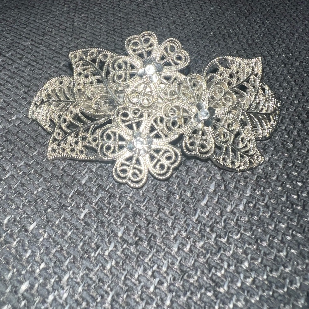 Elegant Silver Floral Brooch